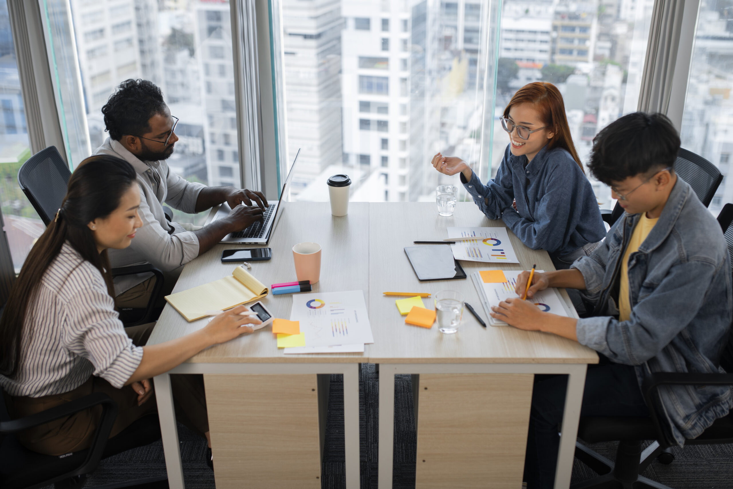 side-view-colleagues-working-together