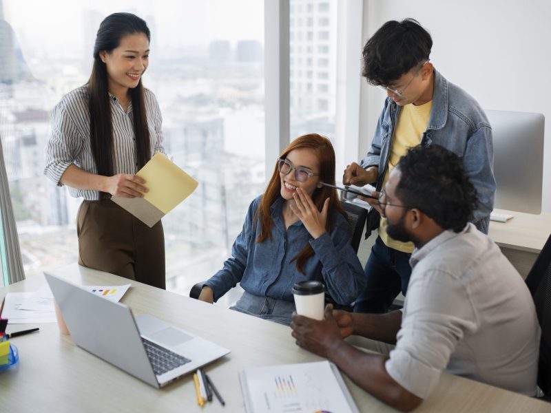 employees-working-together-high-angle